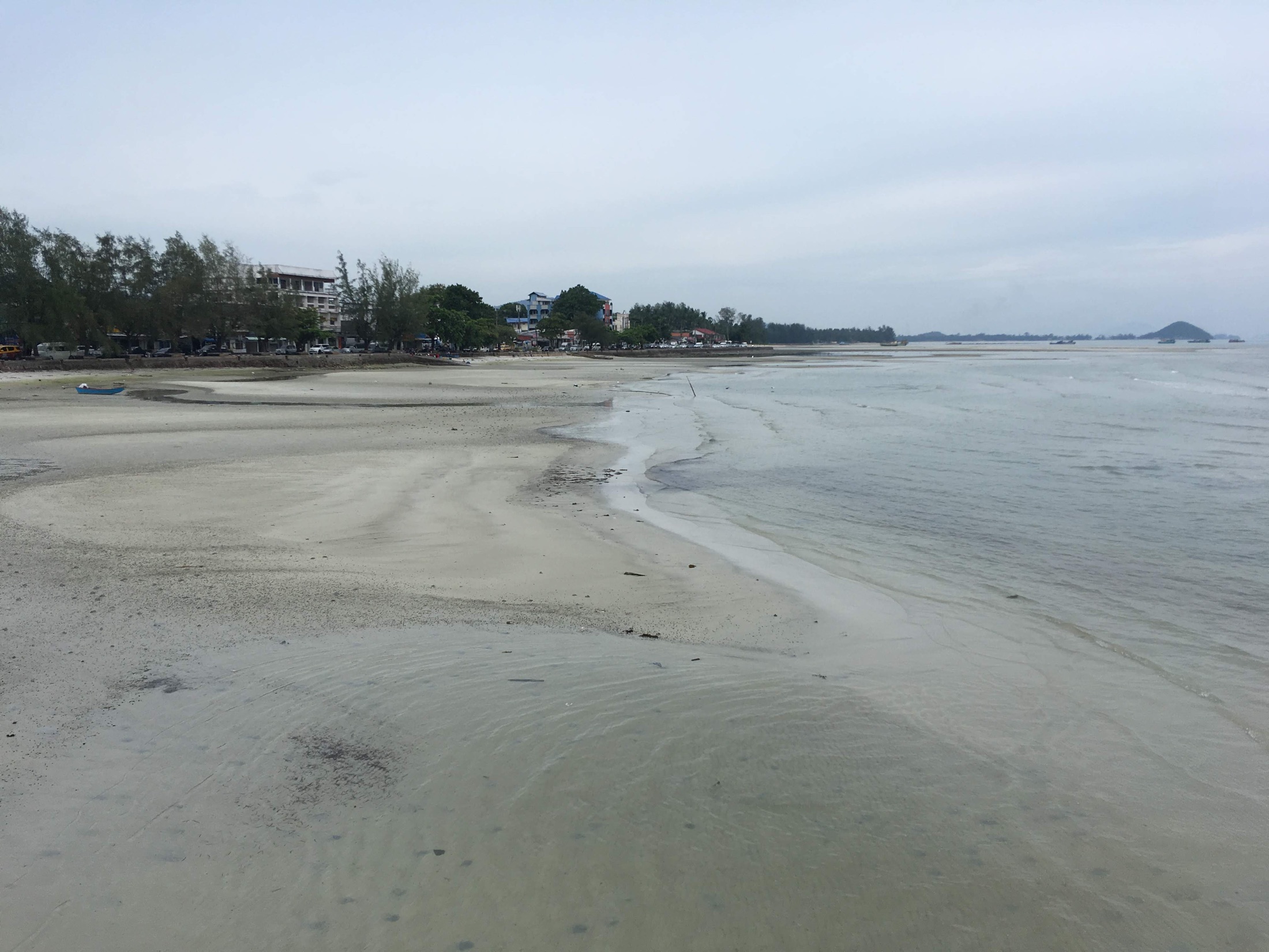 Passenger ferry harbor context for an international island crossing