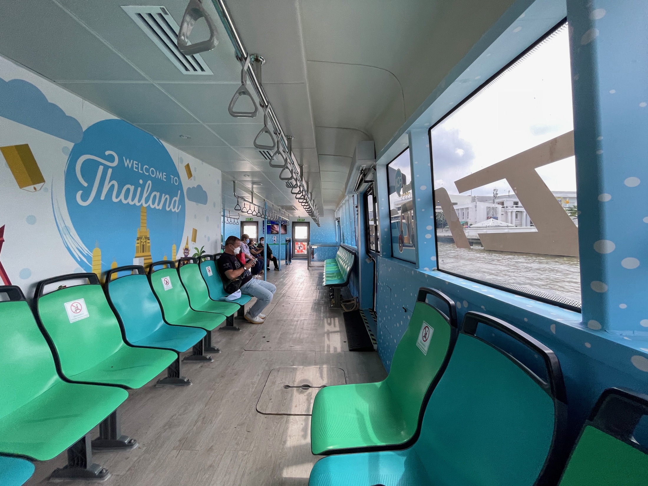 Passenger seating inside a Thai ferry